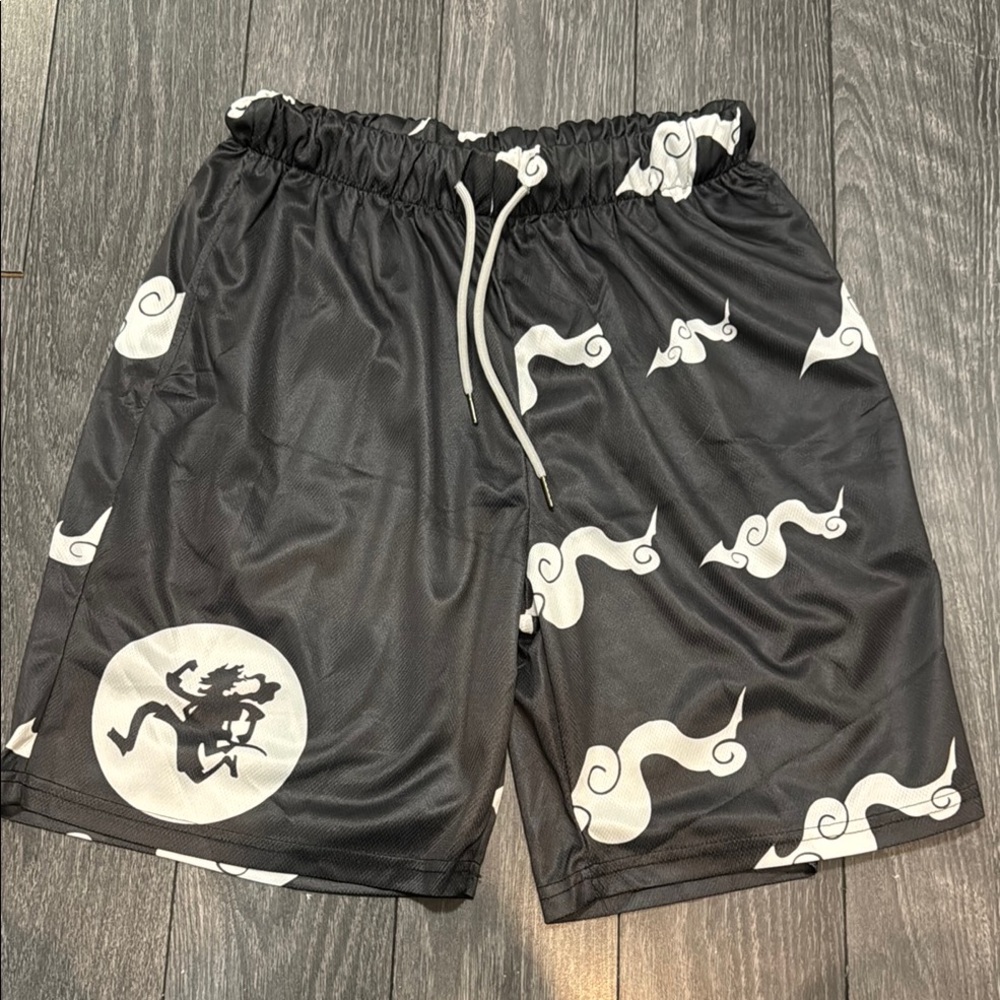 Akatsuki NWOT Black mesh shorts w/ White Clouds Graphic Shorts Youth size XL.